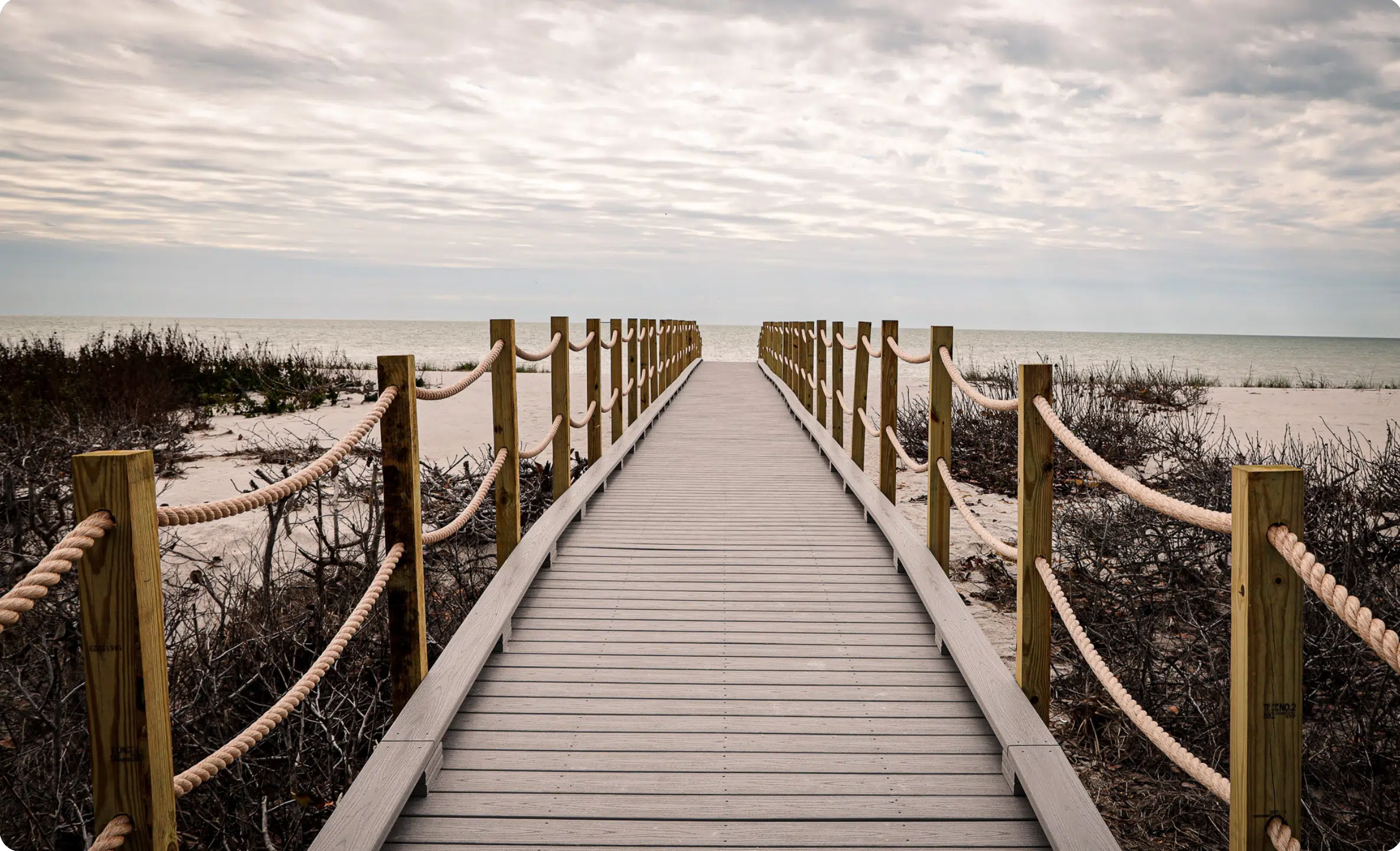 Premium Dock Construction by Crocker Marine Services Boardwalk Decking to the Beach on Sanibel Island